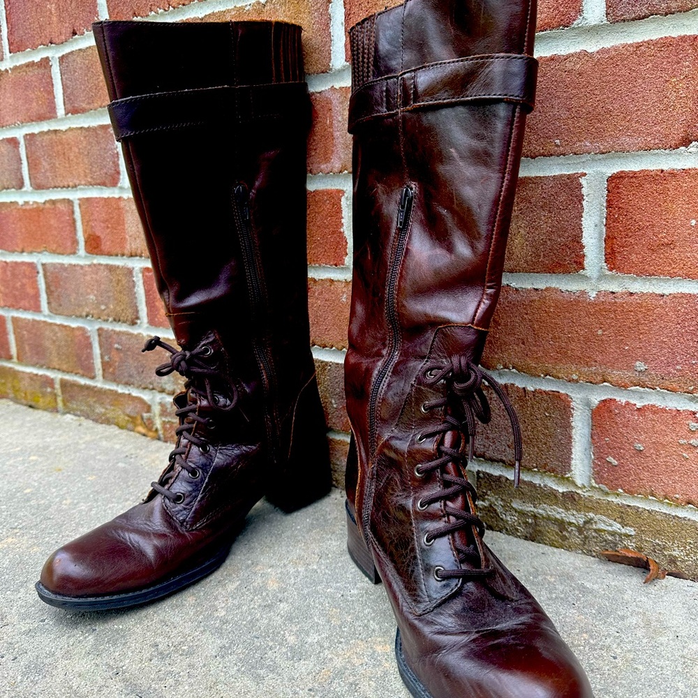 Briwn leather lace up front boots with top buckle Side zip. 1 1/2 inch heel.